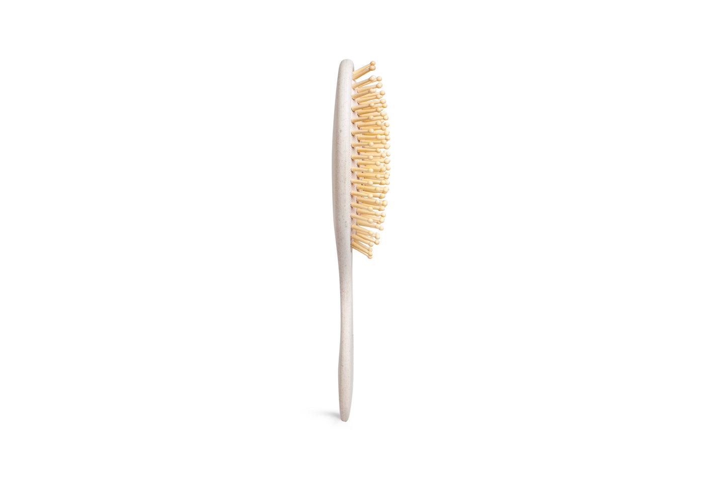 Bionedbrydelige pudebørste i naturlig fiber